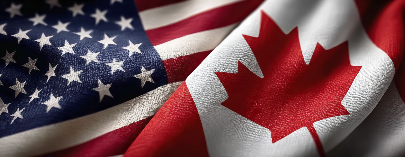 Intertwined American and Canadian Flags